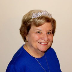 Mrs. Doris Davies was honored with a 'diamond' tiara for her 25 years of service as a Tax-Aide volunteer.