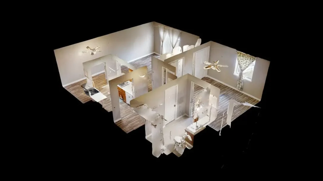 3D cutaway view of a house interior showing multiple rooms and a kitchen.